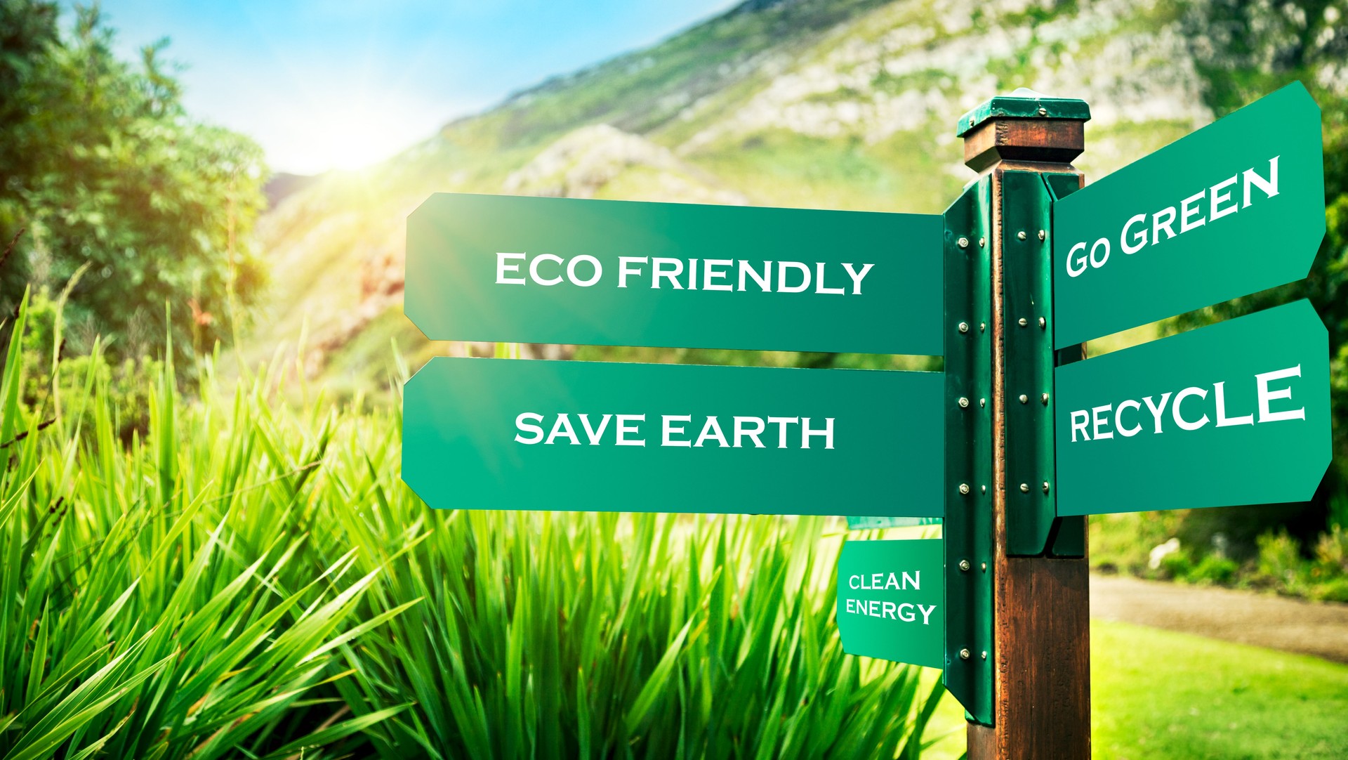 Signpost in the park with eco conceptual directions